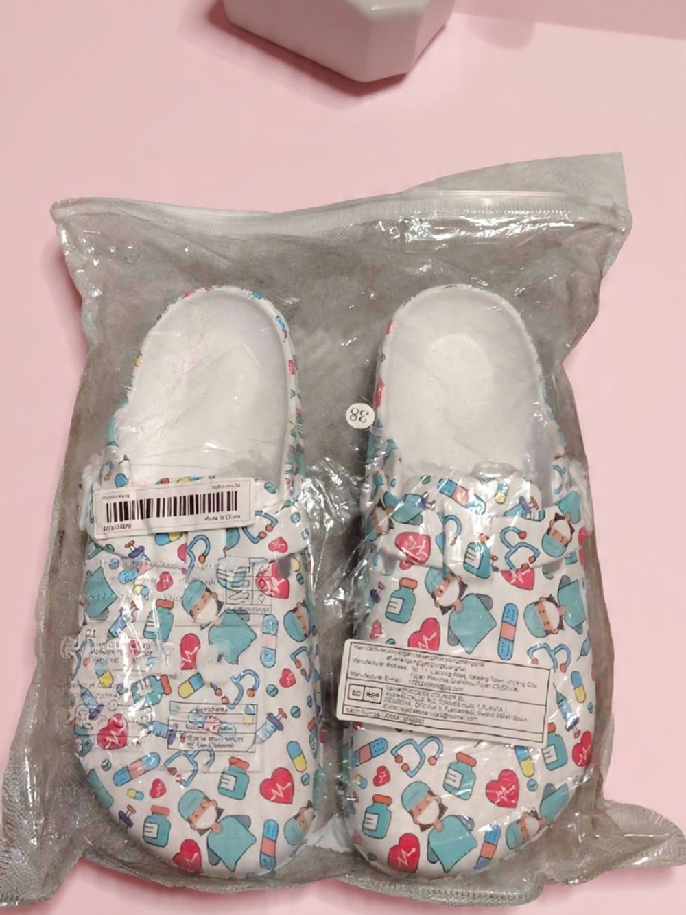 Medical Print Slip-On Shoes in White and Blue For Women Size 38 7/ 7 1/2
